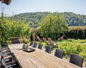 Lora Cosy vacation home in Membre, Ardennes, Belgium with sunny terrace and green surroundings for a relaxing stay.