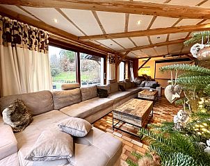 Relax in the recreation room of Lora Cosy, a vacation home in Membre, Ardennes, Belgium, with an inviting pool table.