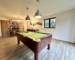 Relax in the luxurious sauna of Lora Cosy, a vacation home in Membre, Ardennes, Belgium, surrounded by serene nature.