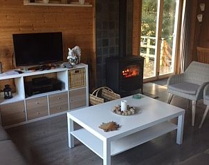 Cozy living room of Chalet Eikenblad in Durbuy, vacation home in the Ardennes, Belgium.