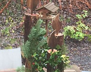 Decorative elements in the garden of Chalet Eikenblad, vacation home in Durbuy, Ardennes.