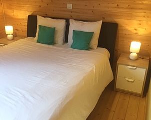 Comfortable bedroom in Chalet Eikenblad, relaxing vacation home in Durbuy, Ardennes.