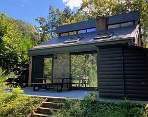 Cottage in Izier, a charming vacation home in the Ardennes, Luxembourg, Belgium, surrounded by green nature and peaceful surroundings.