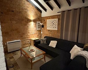 Cozy living room in Holiday home in Izier, Ardennes, Belgium with comfortable seating area and atmospheric lighting.