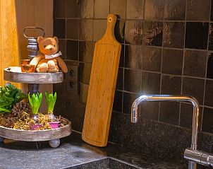Cozy kitchen corner in Cottage in Houffalize, vacation home in the Ardennes, Belgium, with decorative details and rustic charm.
