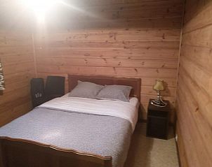 Cozy bedroom with double bed in Chalet Ma Reine, Remouchamps, Ardennes.