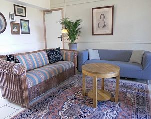 Cozy living room in La Terra vacation home, Durbuy, with comfortable sofas.