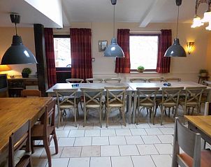 Spacious dining area in La Terra, vacation home Durbuy, ideal for group meals.
