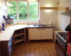Functional kitchen in La Terra, vacation home Durbuy, overlooking nature.