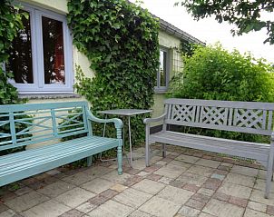 Veranda with benches at La Terra vacation home, Durbuy, perfect for rest.