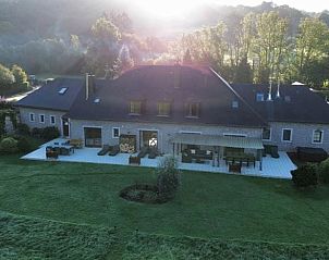 Vakantiehuisje in Ereze, Ardennen biedt een prachtig terras met uitzicht op groene heuvels, ideaal voor een ontspannen verblijf in Belgi.