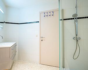 View from the balcony of Apartment Bonito with harbor view in Blankenberge, Belgian coast, with lively city environment.