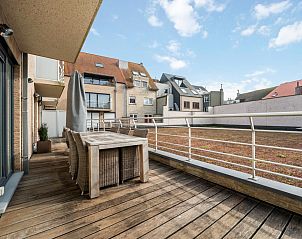 Enjoy the spacious terrace at vacation home Jacob Van Maerlant - V1 in Blankenberge on the Belgian coast, ideal for relaxation.
