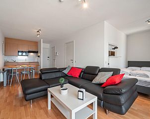 Stilvolle Einrichtung von Ocean Suites - 1108, Ferienhaus in Blankenberge, belgische Kste, mit modernem Wohnzimmer und komfortablem Schlafzimmer.