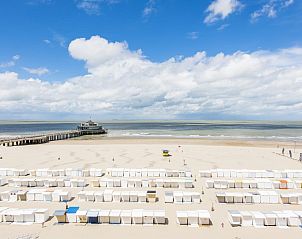 View of the beach at vacation home Ter Duinen - 0601 in Blankenberge, Belgian coast, with sea and pier in the background.