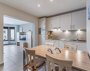 Modern kitchen and dining area in vacation home Prinsenlaan - VER1, Blankenberge, Belgian coast, overlooking cozy living room.