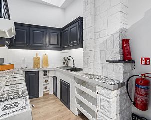 Stylish kitchen in vacation home Badersstraat 3, Blankenberge, Belgian coast with modern decor and cozy atmosphere.