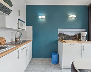 Stilvolle Kche in Ocean Suites  514, einem Ferienhaus an der belgischen Kste in Blankenberge, mit moderner Ausstattung und Kstendekor.