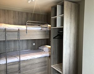 Gezellige slaapkamer met stapelbed in Suite met zeezicht | 6p, vakantiehuis aan de Belgische kust in Blankenberge.