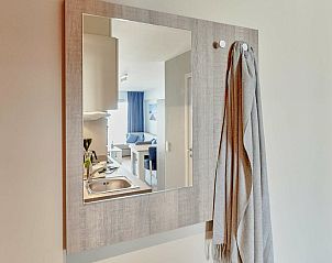 Gezellige binnenruimte van Familiesuite met stadszicht in Blankenberge, Belgische kust, met moderne keuken en comfortabele inrichting.