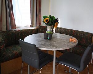 Intimate dining area in chalet Jabbeke no 42, De Haan, Belgian coast, for cozy meals.