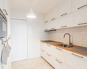 Modern kitchen in Apartment Seaview 2, Bredene, Belgian coast. Perfect vacation accommodation with stylish decor and complete amenities.