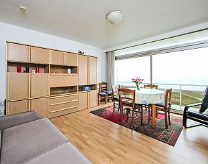 Cozy living room of Apartment Ref. 702 in Bredene on the Belgian coast with spacious view and comfortable seating area.