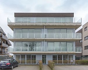 Apartment Ocean in Bredene on the Belgian coast, modern vacation rental with glass balconies and sleek architecture.