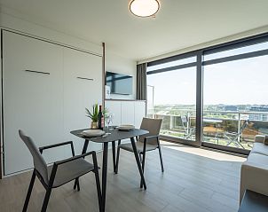 Cozy interior space of Apartment Studio Zeezicht in Bredene, Belgian coast, with panoramic views of the surroundings.
