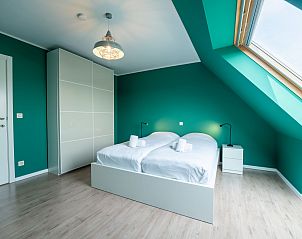 Attraktives Schlafzimmer im Appartement Parklane in Bredene an der belgischen Kste, mit moderner Einrichtung und natrlichem Licht.