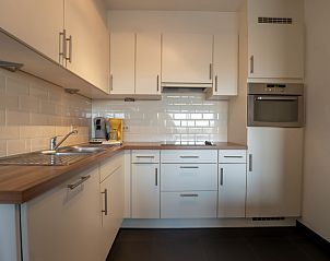 Modern kitchen in Apartment Residence Zeeparel, Bredene, Belgian coast. Comfortable vacation accommodation with stylish decor.