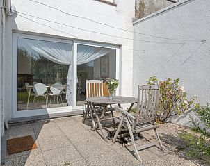 Enjoy the sunny terrace of Holiday home sea-kret in Bredene on the Belgian coast, perfect for relaxation and outdoor dining.