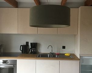 Fully equipped kitchen Holiday home Duinhoevelaan, Bredene-aan-Zee, with modern appliances and cozy interior.