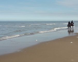Quiet beach walk at Holiday Home Duinhoevelaan, Bredene-aan-Zee, overlooking the sea.