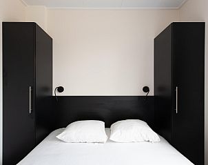 Schlafzimmer der Wood Lodge mit Klimaanlage in Nieuwpoort, belgische Kste. Komfortables Ferienhaus mit moderner Einrichtung fr einen erholsamen Aufenthalt.