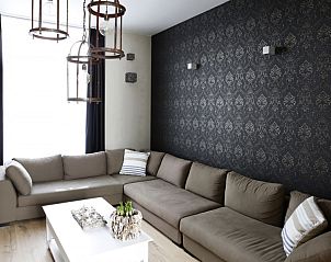 Cozy living room in De Zeester apartment Ostend, Belgian coast with comfortable sofas.