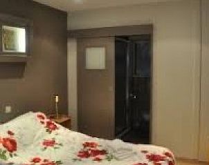 Komfortables Schlafzimmer in der Wohnung Vrij en Blij an der belgischen Kste.