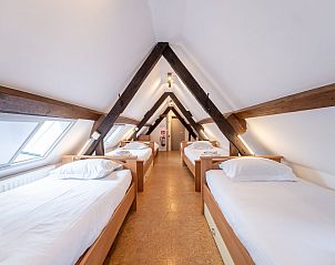 Cozy sleeping loft in Holiday home Dunezwin, De Haan, Belgian coast. Perfect for an authentic vacation in protected cultural heritage.