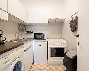 Modern kitchen in Apartment Cosy @ the beach studio with pool, De Haan, Belgian coast, ideal for a comfortable stay.