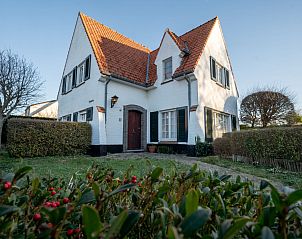 Charming Holiday Home Hamarrb with garden and parking in De Haan, Belgian coast. Enjoy the serene surroundings and classic architecture.