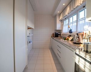 Modern kitchen in Holiday home Hamarrb in De Haan, Belgian coast, with spacious countertops and lots of natural light.