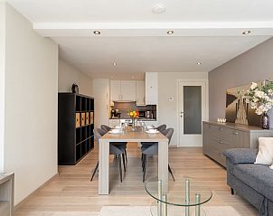 Stylish living room of Apartment Casa Blanca in De Haan, Belgian coast, with comfortable seating area and modern interior.