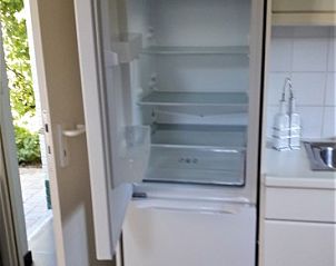 Spacious refrigerator in De Haan Cottage 670, ideal vacation home on the Belgian coast in De Haan.