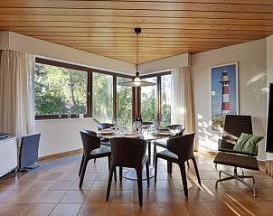 Dining area with lots of light in La Maison Fleurie, vacation home in Koksijde, Belgian coast.